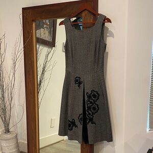 Chic Sleeveless Gray Dress with Black Floral Accents